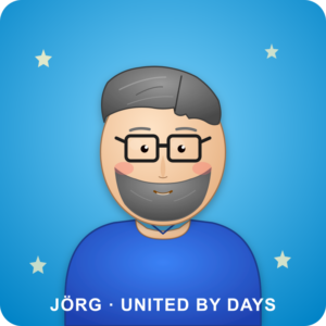 Jörg, Charakter-Avatar von United by Days, mit grauem Vollbart und Brille